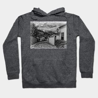 A moody study of a street in Tiradentes. Hoodie